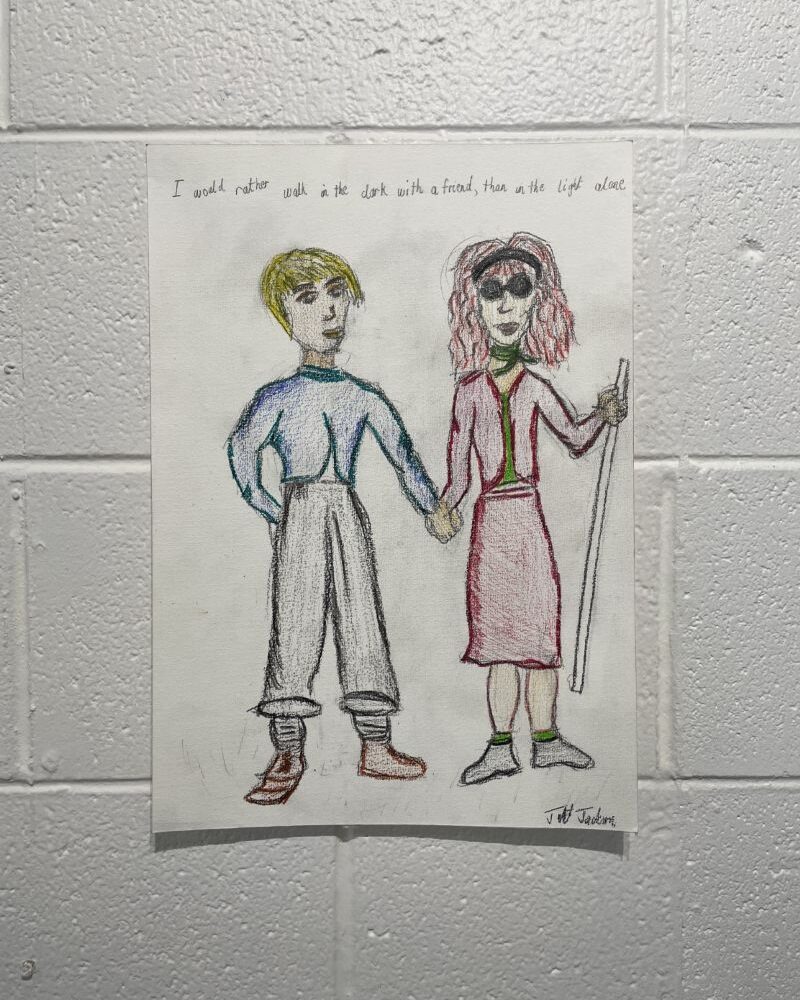 Pencil on card picture of a man and a woman holding hands. The woman has a white cane and dark glasses.