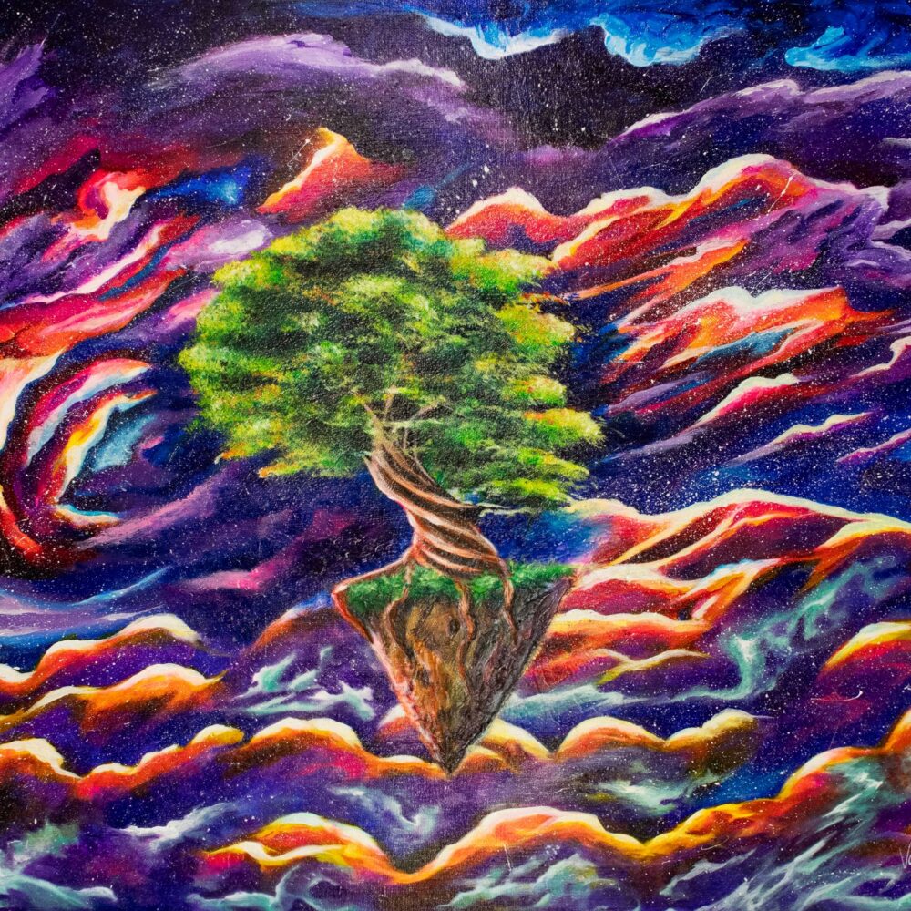 Solitude by Varsha Chetty. Tree on a small plot of earth surrounded by a dramatic storm with purple, pink and blue clouds.